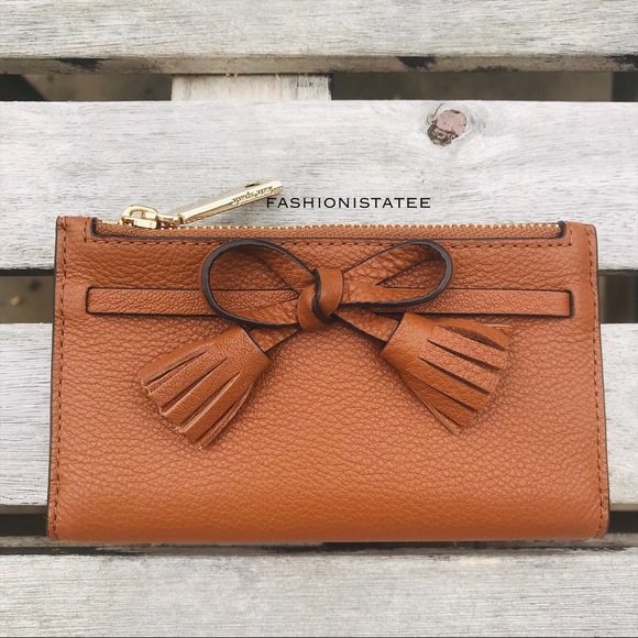 kate spade Handbags - Kate spade New York hayes Small Wallet ginger red